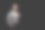 这是一位蓄着胡须的白人男子的肖像，他穿着时髦的西装和衬衫，肩上扛着夹克，看着镜头。在黑色的背景上。图片下载
