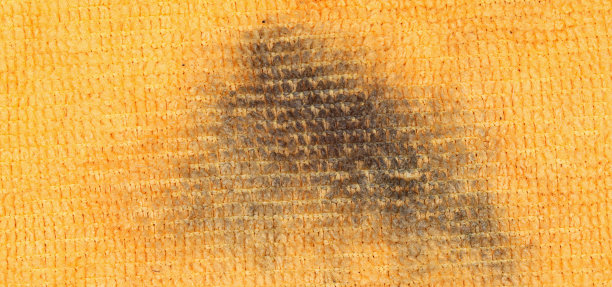 特写肮脏的橙色毛巾纹理细节图片下载