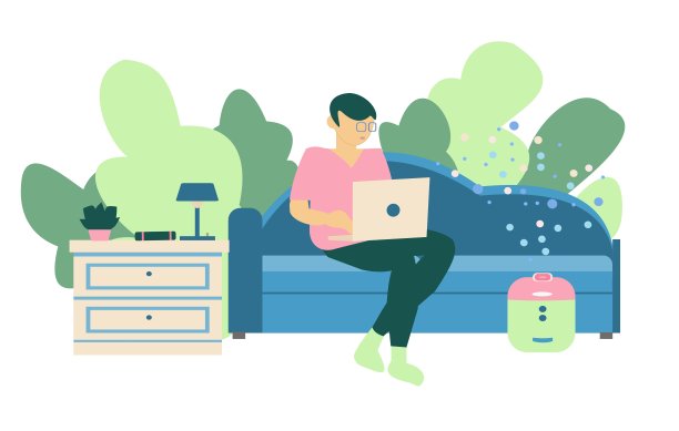 年轻人坐在沙发上，笔记本和加湿器放在床头柜上图片下载