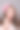 黑发少女与粉红色玫瑰在她的头发在灰色背景。头上卷着的花。时尚的照片图片下载