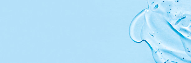 蓝色背景上的透明透明质酸凝胶。图片下载