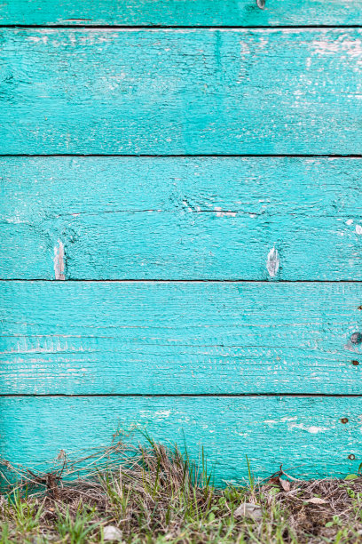 旧栅栏的纹理与剥落的蓝色油漆图片下载