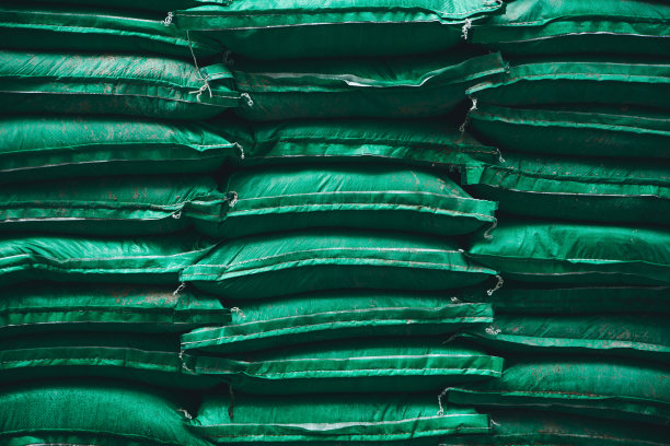 绿色工业袋堆背景图片下载