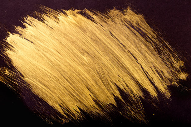 黑色背景上的金色笔触图片下载