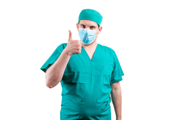 戴着口罩和帽子的医生，竖起大拇指。图片下载
