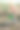 老农穿着工作服在田间用喷壶给有机菜园浇水。图片下载