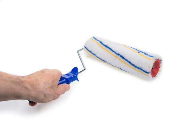 新漆辊子上有一个白色的手柄图片下载