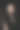 美丽的肖像年轻女子与黑色羽毛衣领周围她的脖子。女孩，在脸上画上大胆的对比妆图片下载