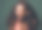 一个迷人和古怪的年轻女子在工作室的绿色背景下摆姿势的剪裁镜头图片下载