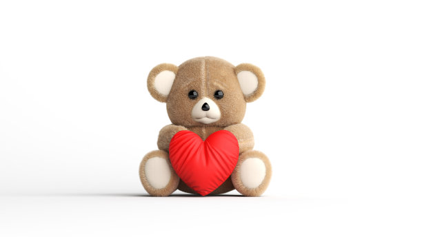 一个心形枕头的小玩具熊。图片下载