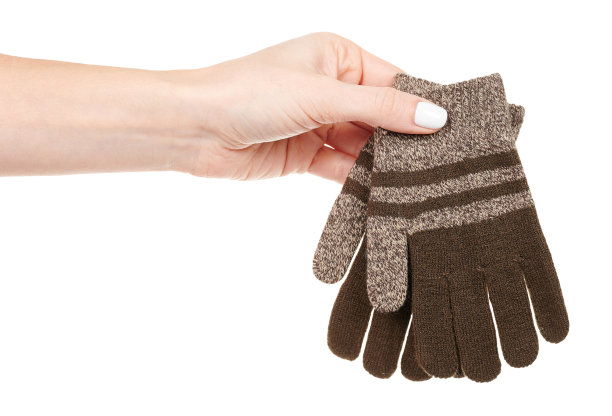 手戴棕色儿童手套，隔离在白色背景上图片下载