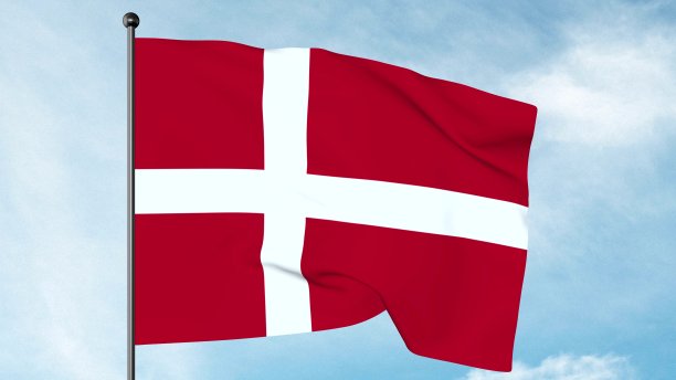 丹麦的国旗是红色的，白色的斯堪的那维亚十字一直延伸到国旗的边缘图片下载