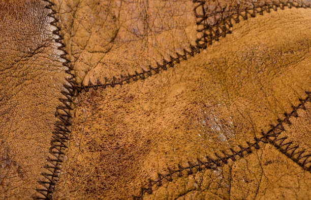 老古董真皮真皮质地柔软背景，顶层有毛孔和划痕，宏观，特写图片下载