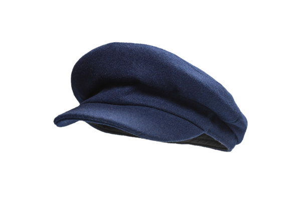 女蓝色帽子与一个遮阳板隔离在白色。图片下载