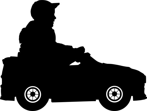 小男孩在一辆儿童电动车剪影图片下载