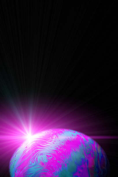 空间星系的星球。银河系中的地球，黑色背景上的抽象太阳。彩色抽象荧光油墨在水中。图片下载