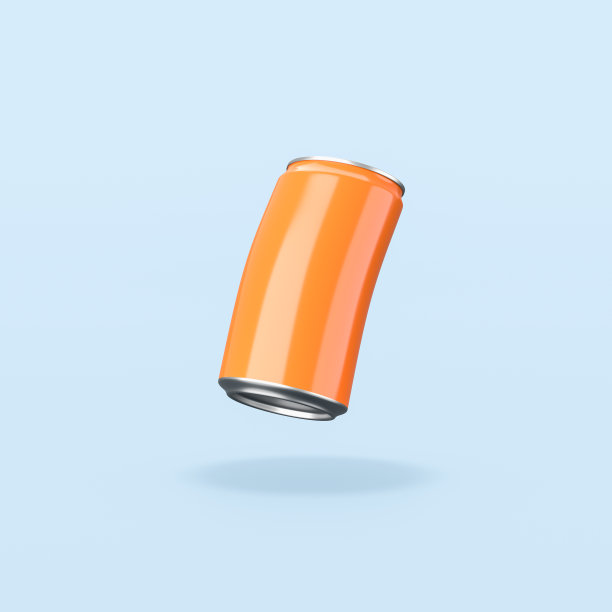 橙色饮料罐头在蓝色背景图片下载