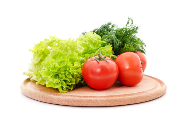 蔬菜放在板上。图片下载