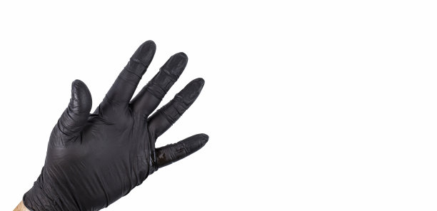 一个戴着黑色手套的男人的手，张开的手掌在一个白色的孤立的，复制空间，文本的地方。图片下载