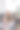 年轻女子坐在扶手椅上，拿着一面镜子看着自己。人类健康的概念。图片下载