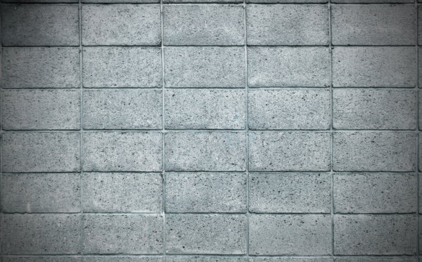 水泥抹面上粗糙纹理的混凝土墙面呈浅灰色，带有网格线图案图片下载