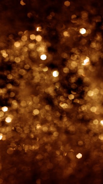 抽象的垂直金色散焦纹理旗帜背景与散焦灯光图片下载