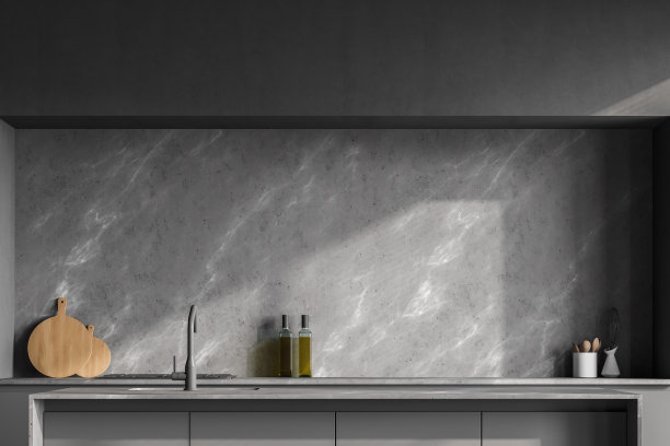 现代现代设计厨房室内。餐厅岛与水槽。灰色、大理石和混凝土石材。模仿墙上的复制空间。图片下载