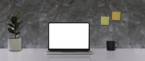 模拟笔记本电脑的空白白色屏幕放置在办公室的白色桌子上图片下载