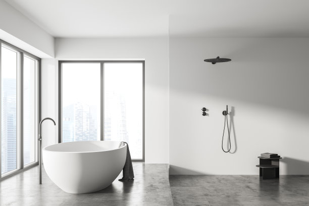 现代宽敞的浴室内部设计在摩天大楼与大全景窗户新加坡城市景观。白色浴缸和淋浴空间，简约的混凝土外观。图片下载