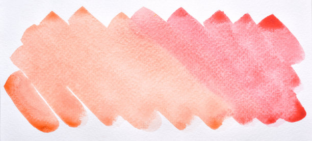 一幅抽象橘色和红色水彩的照片图像在纸上，手画红橘色和红色水彩的梯度为背景，湿法技术在纸上混合不同的颜色图片下载