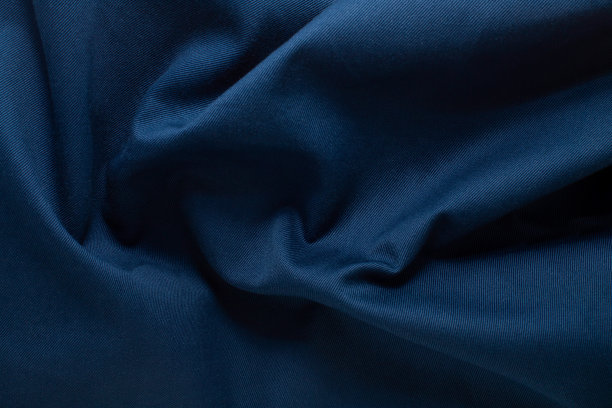 纹理皱，皱的自然蓝色织物特写。你的模型的背景图片下载