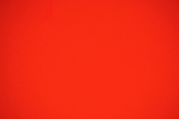 亮橙色材料的单色表面，边缘有渐晕和渐变。图片下载