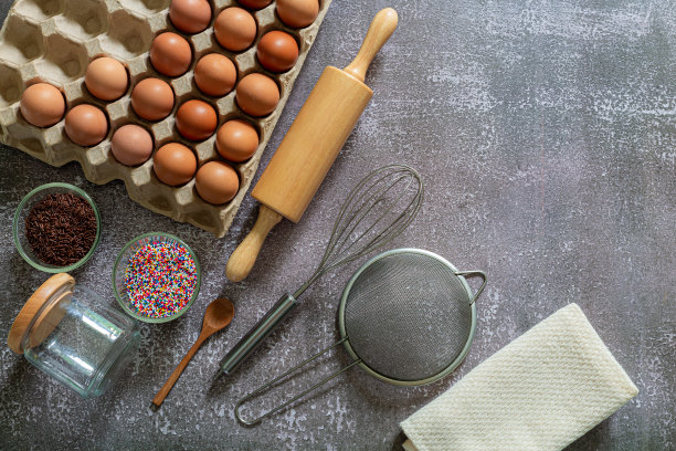 烘焙的背景。食品配件。面团的原料多种多样。概念食谱蛋糕一个柠檬和派。Taop视图。平的。为文本复制空间。图片下载