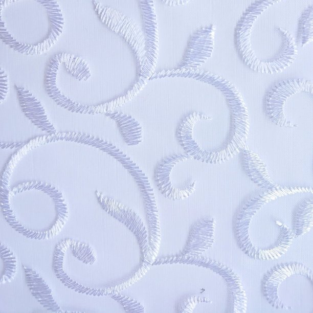 白色棉质织物纹理，绣有漩涡花边图片下载