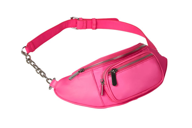 时尚明亮的臀部袋在粉红色。白色背景。一个时尚配件。图片下载
