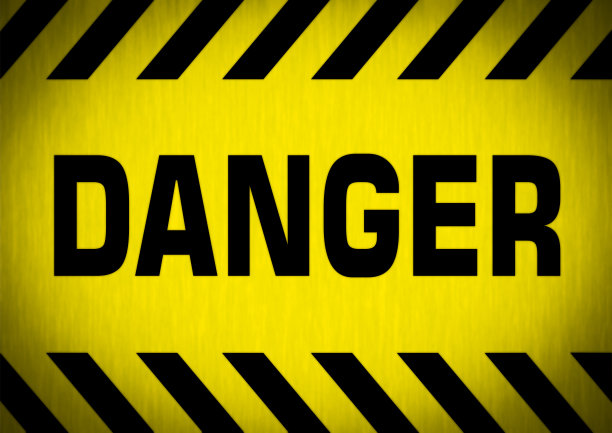 注意警告标志。危险警告标志。黄色背景上的黑色条纹。图片下载