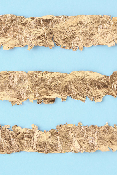 蓝色背景上的金色条纹，复制空间，设计模板。图片下载