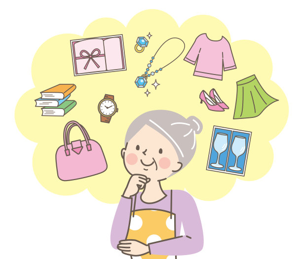 老年妇女在考虑在跳蚤市场出售的产品图片下载