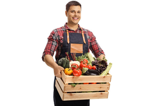 年轻男性市场工人，装着蔬菜图片下载
