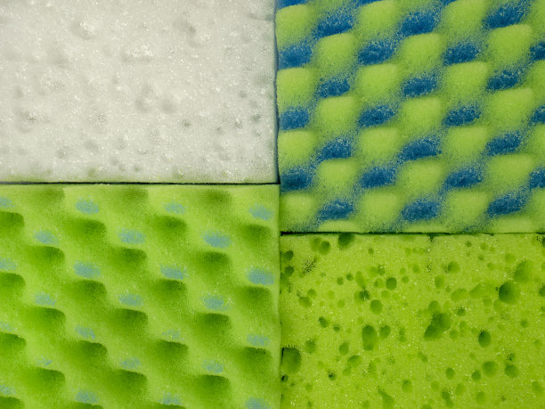这是洗碗海绵质地的特写。家庭清洁的概念。海绵的菜肴图片下载