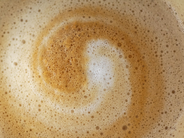 卡布奇诺牛奶泡沫螺旋特写图片下载