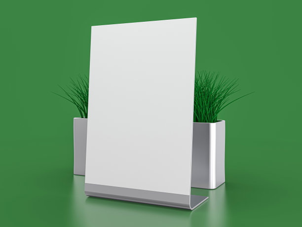 空白纸桌子帐篷。模型在绿色背景。3 d演示。图片下载