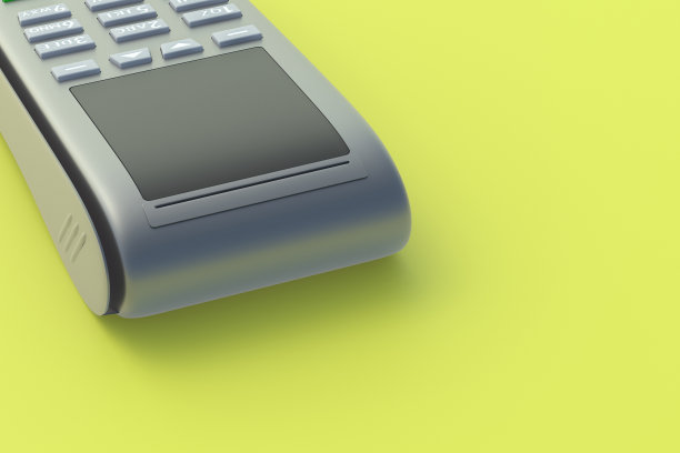 黄色背景的便携式收银机。副本的空间。三维渲染图片下载