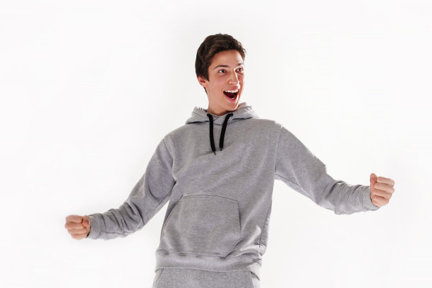 英俊快乐微笑的男人。赢家。成功。图片下载