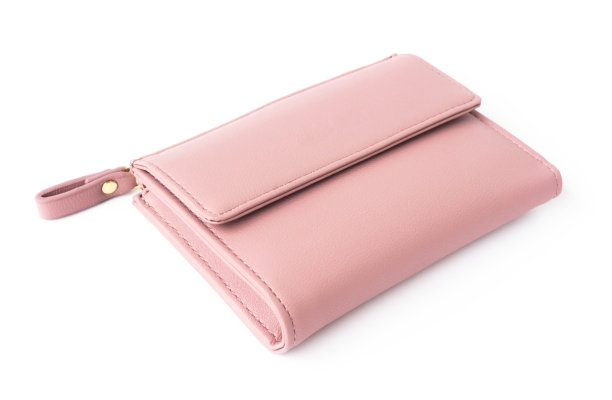 特写现代粉色女人钱包上的白色背景图片下载