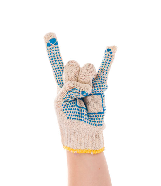 一只手戴着针织手套显示岩石标志。图片下载
