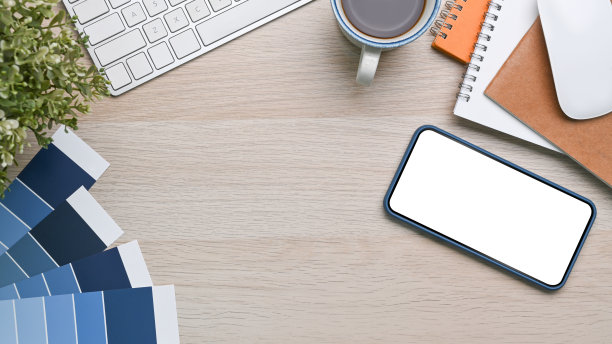 手机，笔记本，室内植物和咖啡杯在创造性的工作空间。平躺和顶视图。图片下载