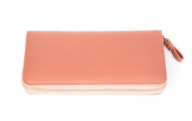 特写现代玫瑰粉色女人钱包在白色的背景图片下载