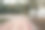 有一条自行车道和一个风景如画的秋天公园的小巷图片下载