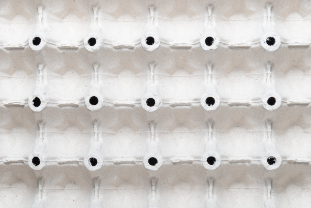 蛋盒背景。回收纸浆蛋盘。图片下载